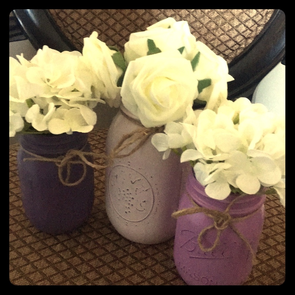 Set of 3 different shades of purple mason jars.